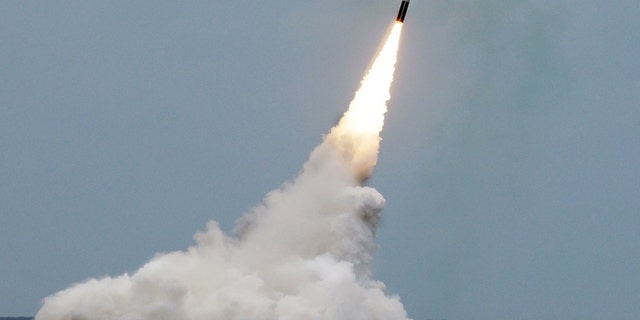 File photo - An unarmed Trident II D5 missile launches from the Ohio-class fleet ballistic missile submarine Maryland off the coast of Florida.