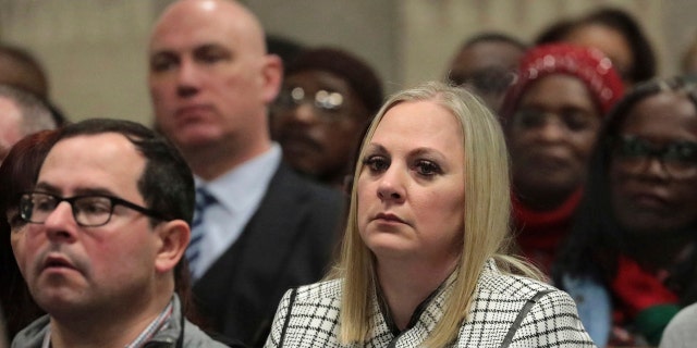 In this Friday, Jan. 18, 2019 file photo, Tiffany Van Dyke, wife of former Chicago police Officer Jason Van Dyke, attends his sentencing hearing at the Leighton Criminal Court Building, in Chicago, for the 2014 shooting of Laquan McDonald.