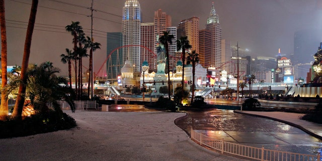 A dusting of snow covers an area along the Las Vegas Strip, Thursday, Feb. 21, 2019, in Las Vegas. A winter storm is expected to drop up to 3 inches of snow on Las Vegas' southern and western outskirts while other parts of the metro area will get rain mixed with snow.