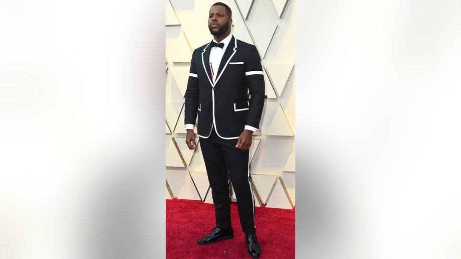 Winston Duke arrives at the Oscars on Sunday, Feb. 24, 2019, at the Dolby Theatre in Los Angeles. (Photo by Jordan Strauss/Invision/AP)