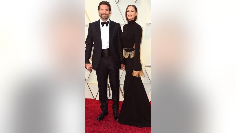 Bradley Cooper, left, and Irina Shayk arrive at the Oscars on Sunday, Feb. 24, 2019, at the Dolby Theatre in Los Angeles. (Photo by Jordan Strauss/Invision/AP)