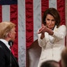 President Donald Trump turns to House Speaker Nancy Pelosi and Vice President Mike Pence as he delivers his State of the Union address in Washington, Feb. 5, 2019. 