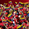Supporters of President Nicolas Maduro wave Venezuelan national flags during a rally in Caracas, Venezuela, Feb. 2, 2019. 