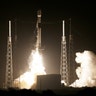 A SpaceX Falcon 9 rocket lifts off with Israel's Lunar Lander and an Indonesian communications satellite at space launch complex 40 in Cape Canaveral, Fla., Feb. 21, 2019. 