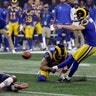 Los Angeles Rams Greg Zuerlein kicks a field goal as Johnny Hekker holds during the second half of the Super Bowl in Atlanta, February 3. 2019.