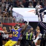 New England Patriots Stephon Gilmore intercepts a pass intended for Los Angeles Rams' Brandin Cooks during the second half of the Super Bowl in Atlanta, February 3. 2019.