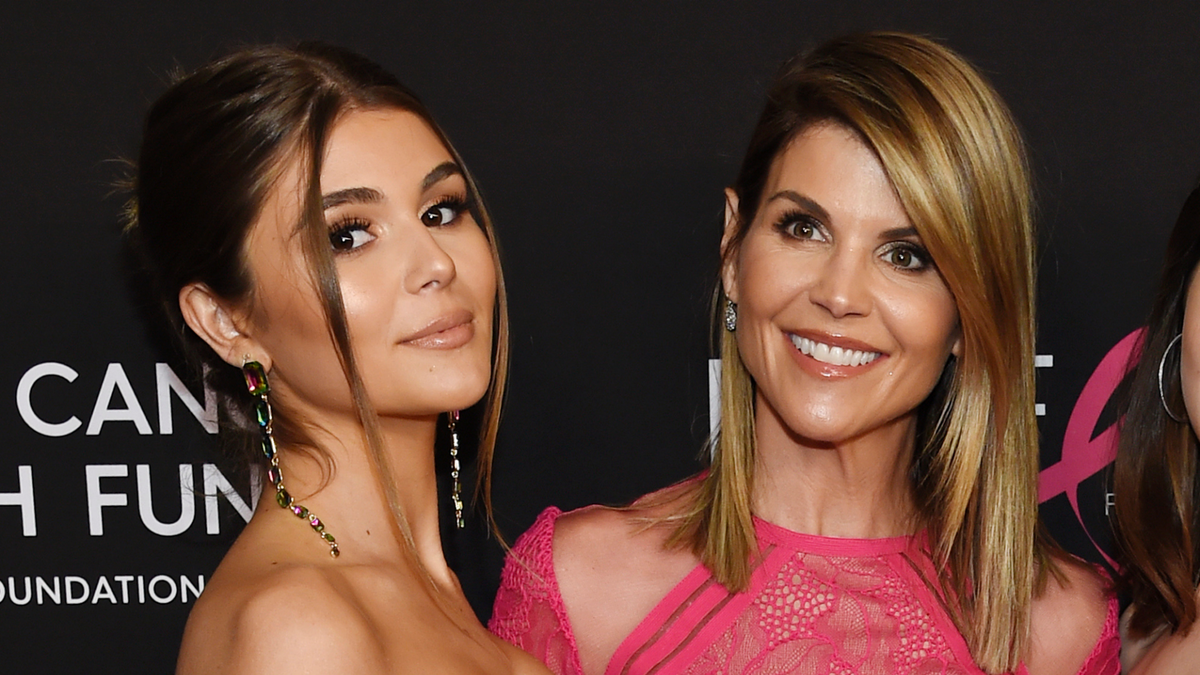 In this Feb. 28, 2019 file photo, actress Lori Loughlin poses with her daughter Olivia Jade Giannulli, left, at the 2019 "An Unforgettable Evening" in Beverly Hills, Calif. (Photo by Chris Pizzello/Invision/AP, File)