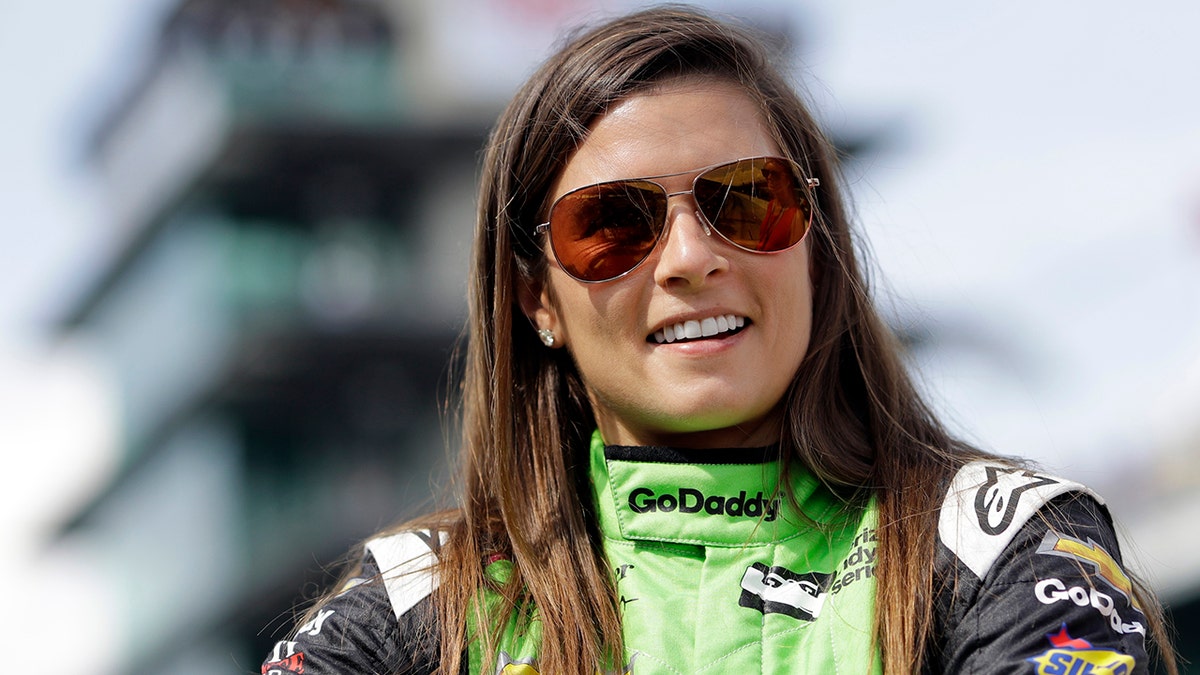 FILE - In this May 20, 2018, file photo, Danica Patrick waits during qualifications for the IndyCar Indianapolis 500 auto race at Indianapolis Motor Speedway in Indianapolis. 