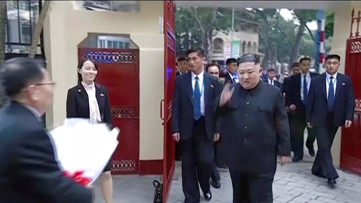 In this image made from video released on Wednesday, March 6, 2019, by North Korean broadcaster KRT, North Korean leader Kim Jong Un waves as he visits the North Korean Embassy in Hanoi, Vietnam.