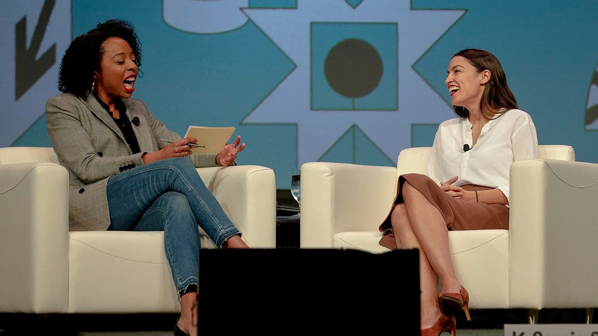 Rep. Alexandria Ocasio-Cortez, right, D-N.Y., speaks with Briahna Gray, a senior politics editor at the Intercept, during South by Southwest on Saturday, March 9, 2019, in Austin, Texas. (Nick Wagner/Austin American-Statesman via AP)