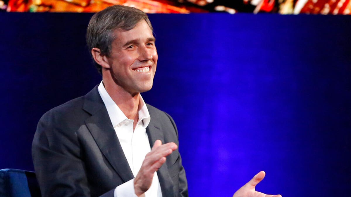 Beto O'Rourke laughing during an Oprah Winfrey in New York last February. (AP Photo/Kathy Willens, File)