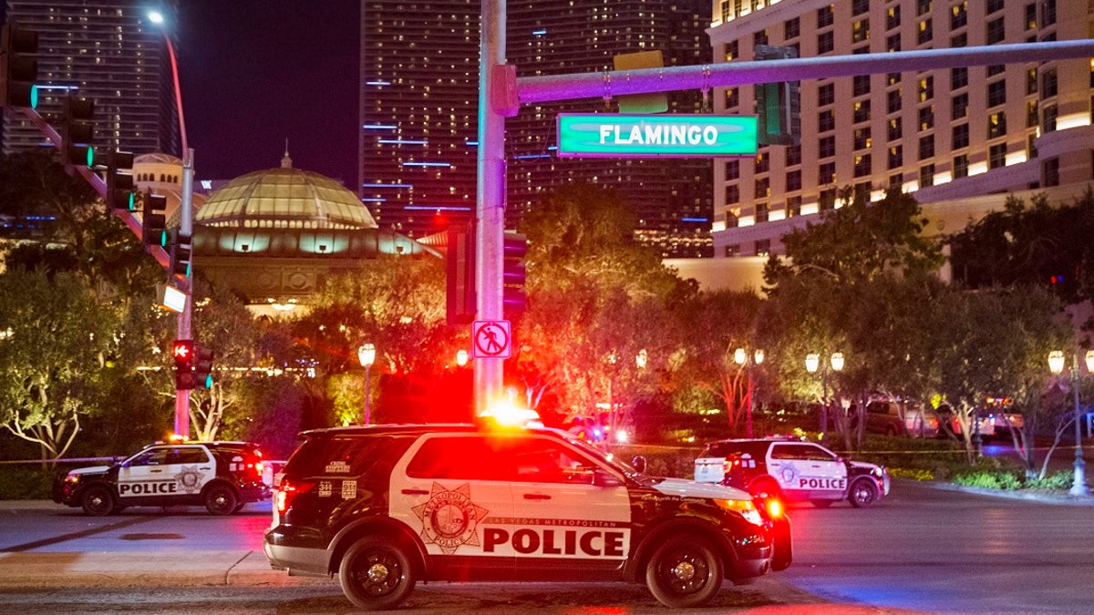 Police respond to an officer-involved shooting in front of Bellagio on Friday, March 15, 2019, in Las Vegas. (Associated Press)