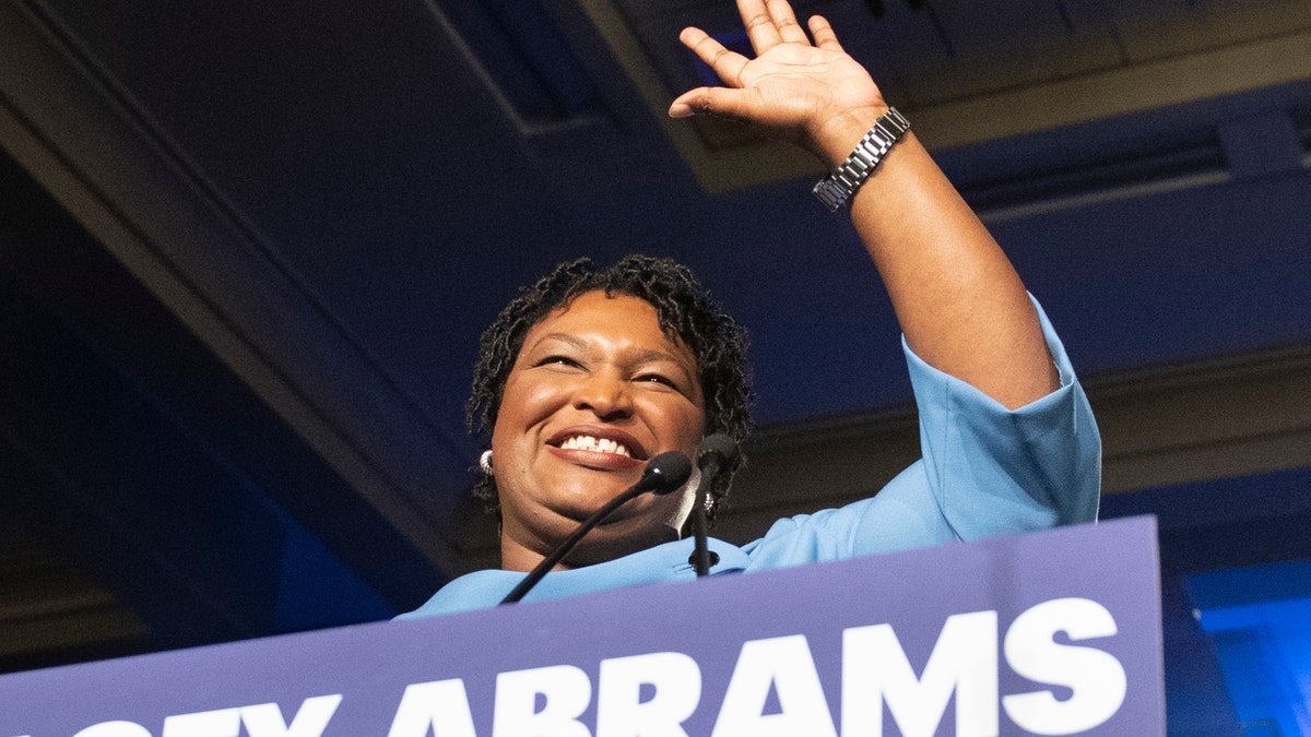 In this Nov. 6, 2018 file photo, former Georgia Democratic gubernatorial candidate Stacey Abrams speaks to supporters in Atlanta. (AP Photo/John Amis)
