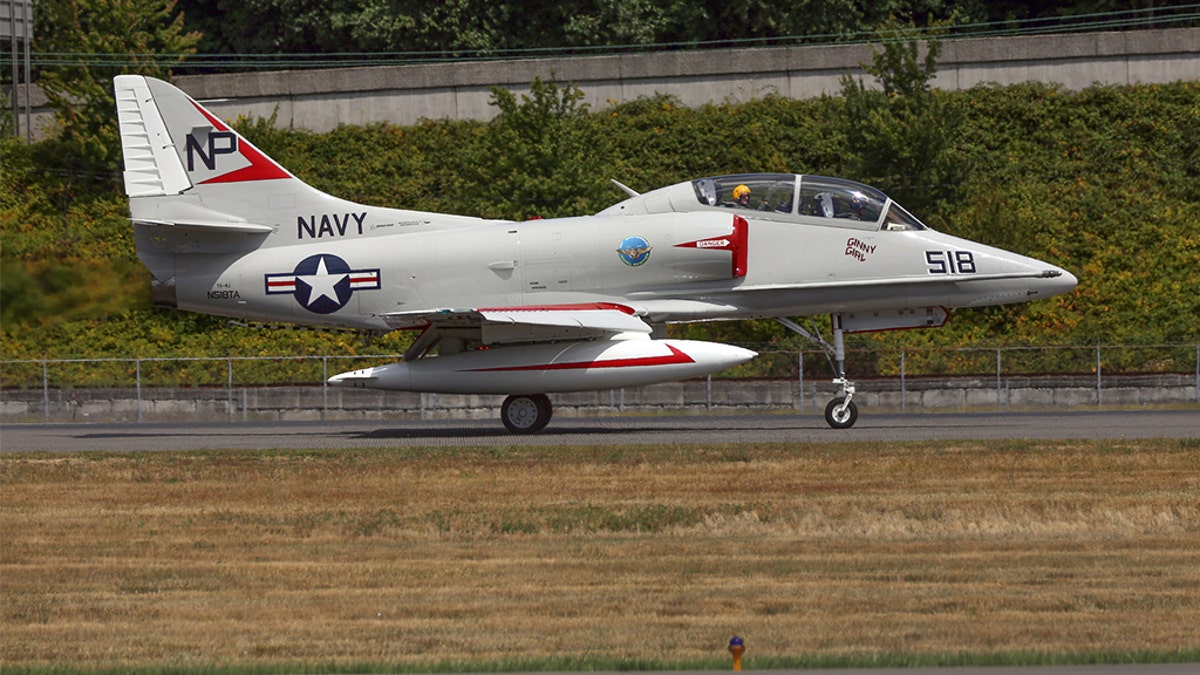 Seattle, Wa, United States - July 17, 2016: The TA-4J, a 2-seater version of the A4 Skyhawk light navy jet fighter was seen flying over Seattle for Boeing's centennial celebrations.