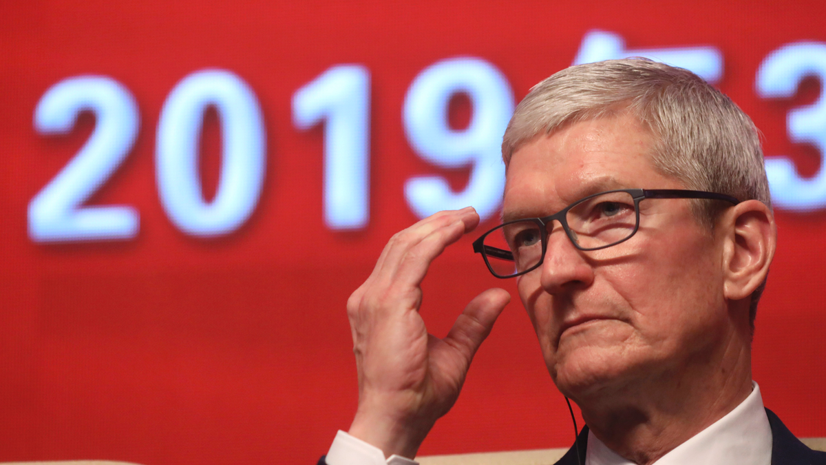 Apple CEO Tim Cook reacts during the Economic Summit held for the China Development Forum in Beijing, China, Saturday, March 23, 2019. (AP)