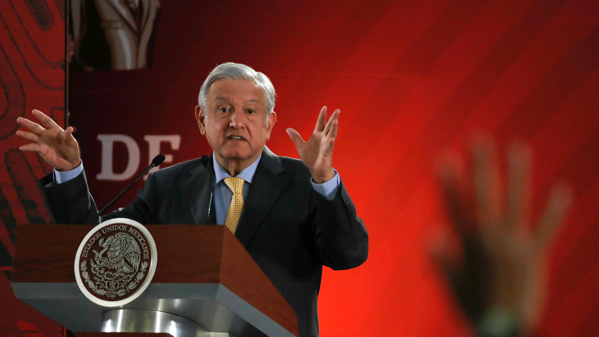 Mexican President Andres Manuel Lopez Obrador answers questions from journalists at his daily 7 a.m. press conference at the National Palace in Mexico City. (AP Photo/Marco Ugarte)
