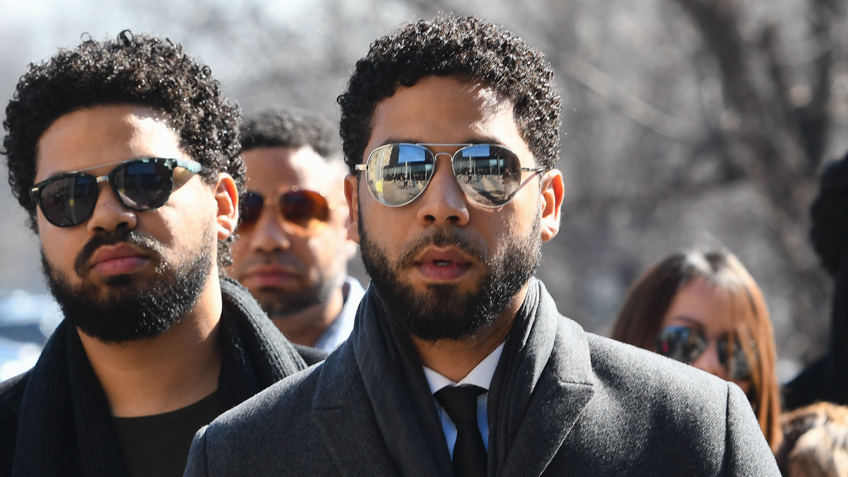 "Empire" actor Jussie Smollett, center, when he arrived at Leighton Criminal Court Building on Tuesday, March 12, 2019, in Chicago.(AP Photo/Matt Marton)