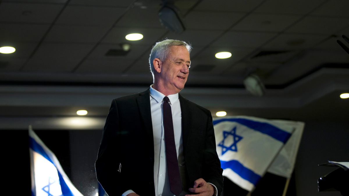 In this Wednesday, March 27, 2019 file photo, retired Israeli general Benny Gantz, one of the leaders of the Blue and White party, prepares to deliver a speech during election campaigning for elections to be held April 9, in Ramat Gan, Israel. Down in the polls, Israeli Prime Minister Benjamin Netanyahu’s Likud Party has released a new campaign trying to paint Gantz, his main rival, as mentally unstable. The video ads are the latest move in a campaign that has been heavy on personal insults and short on substance. (AP Photo/Oded Balilty, File)