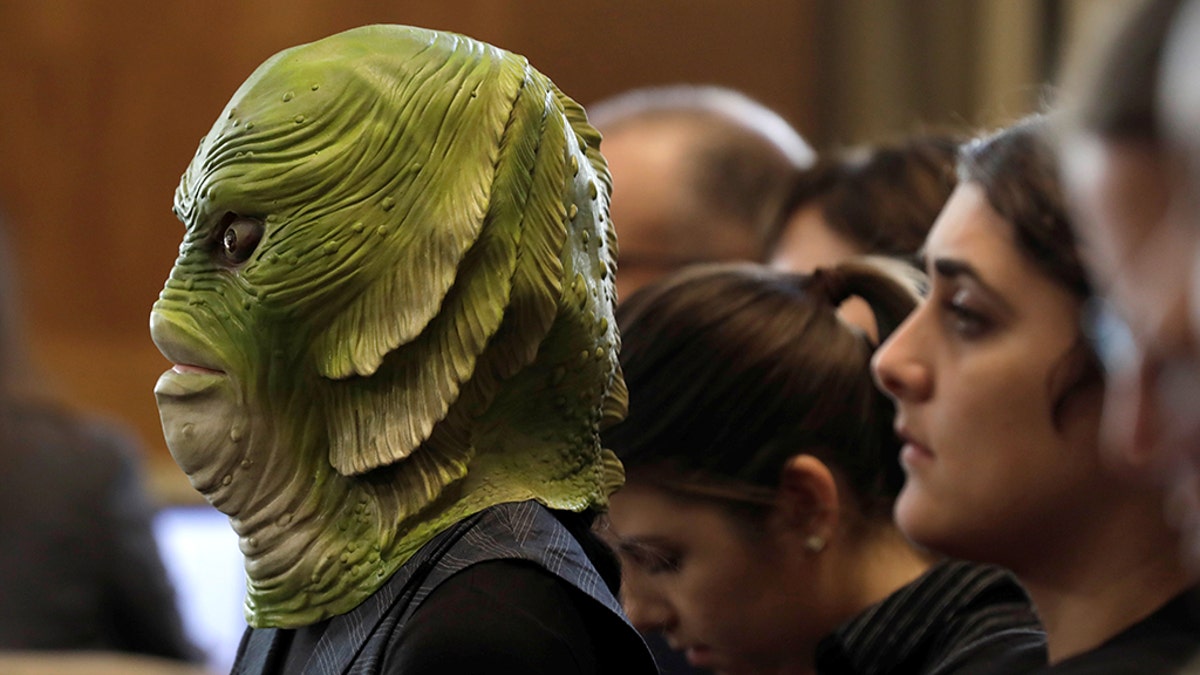 A Greenpeace USA activist attends a Senate Energy and Natural Resources Committee nomination hearing for former energy lobbyist David Bernhardt to be Interior secretary, on Capitol Hill.