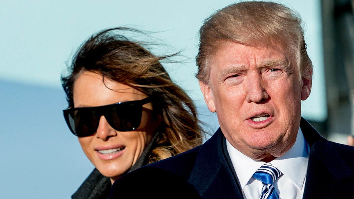 President Trump and first lady Melania arrive at Andrews Air Force Base, Md., Saturday. (AP Photo/Andrew Harnik)