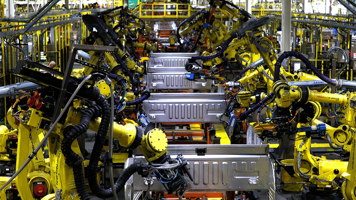 Ford F150 trucks go through robots on the assembly line at the Ford Dearborn Truck Plant on September 27, 2018 in Dearborn, Michigan. The Ford Rouge Plant is celebrating 100 years as America's longest continuously operating auto plant. (Photo by Bill Pugliano/Getty Images)