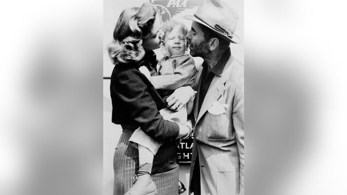 Humphrey Bogart And Lauren Bacall with their son. — Getty