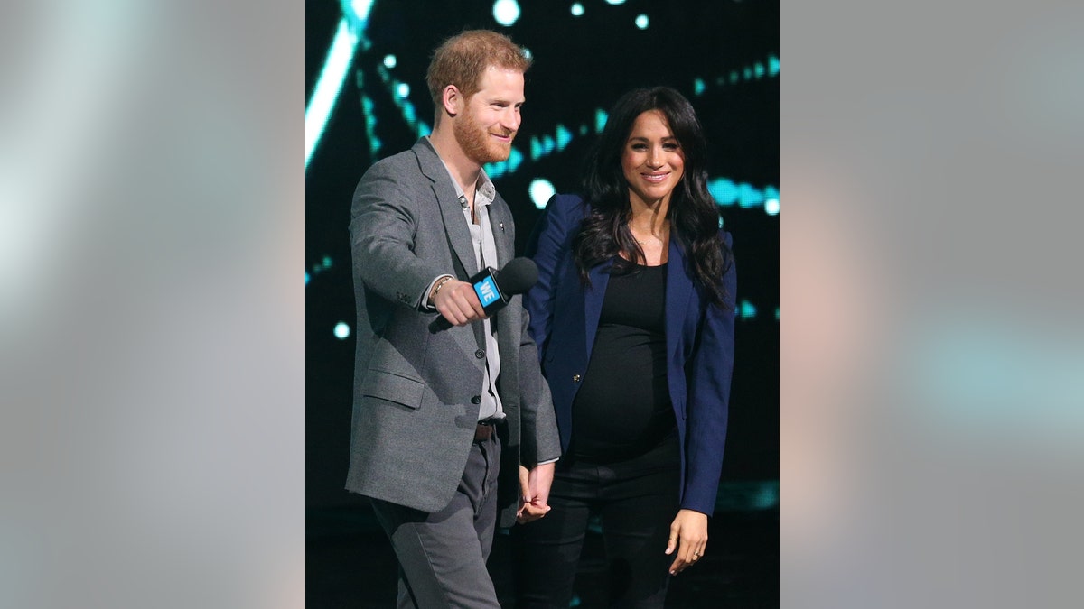The Duke of Sussex and the Duchess of Sussex during his visit to WE Day UK at the SSE Arena in Wembley, London.