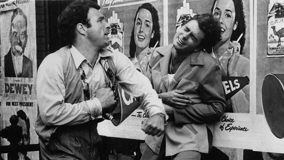 James Caan knocks out Gianni Russo in a scene from the film "The Godfather," 1972.