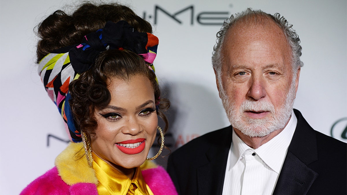 Singer Andra Day (L) and record producer Adrian Gurvitz arrive at the 3rd Annual Hollywood Beauty Awards at Avalon Hollywood on Feb. 19, 2017 in Los Angeles, Calif. — Getty