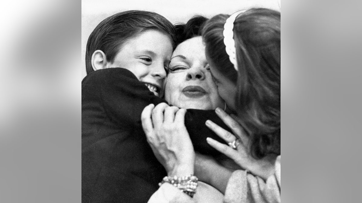 Judy Garland with two of her children, shortly after she settled in England.