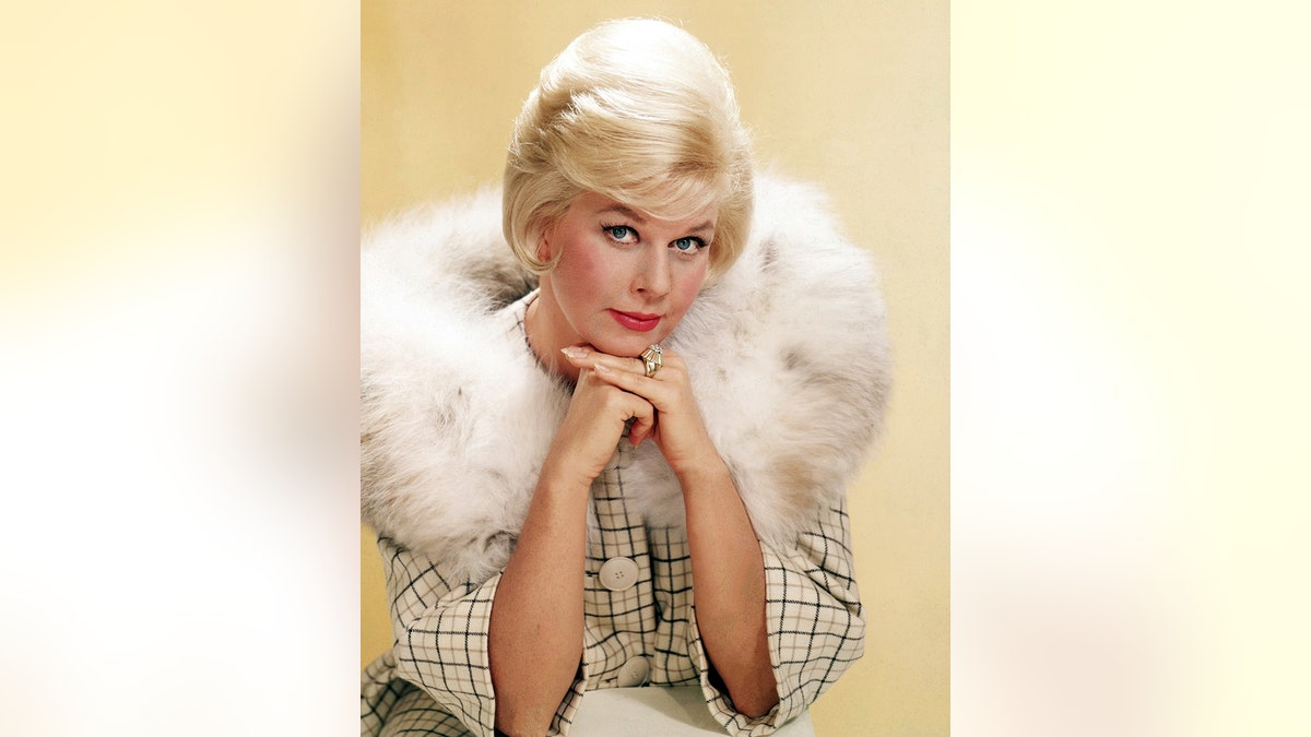 American actress Doris Day in a fur-trimmed coat, circa 1963.