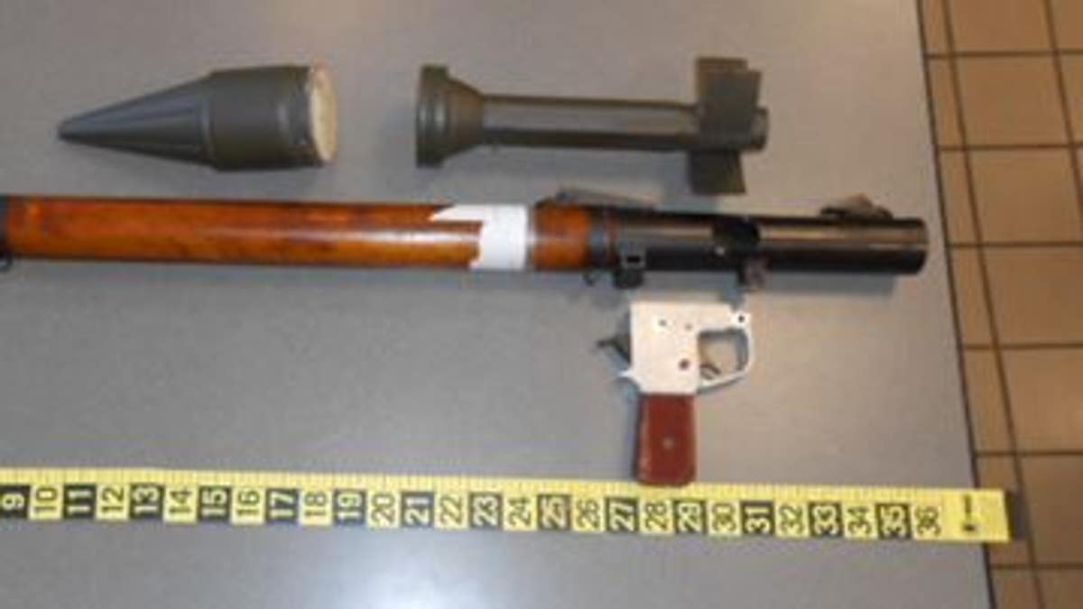 Officers quickly found that the grenade launcher was not a functioning weapon, but a replica.