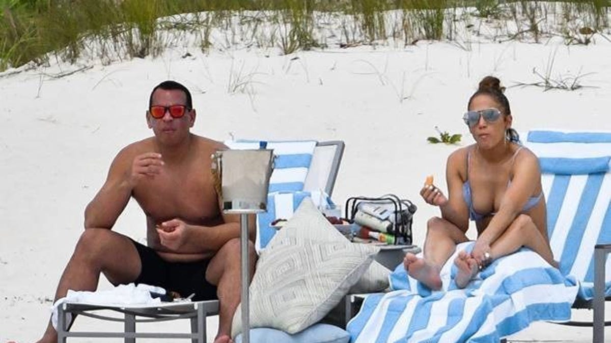 Jennifer Lopez and Alex Rodriguez on the beach