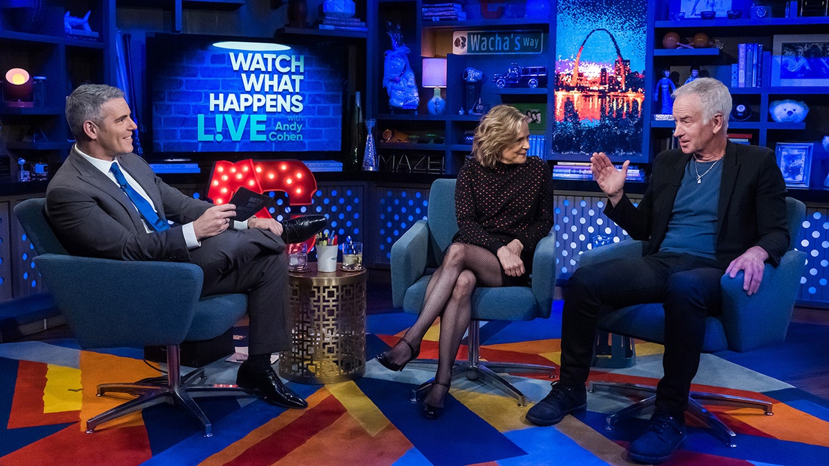 Tennis legend John McEnroe, right, told Andy Cohen, left, and fellow "WWHL" guest Amy Sedaris that former father-in-law Ryan O'Neal is a ‘particularly heinous individual.’