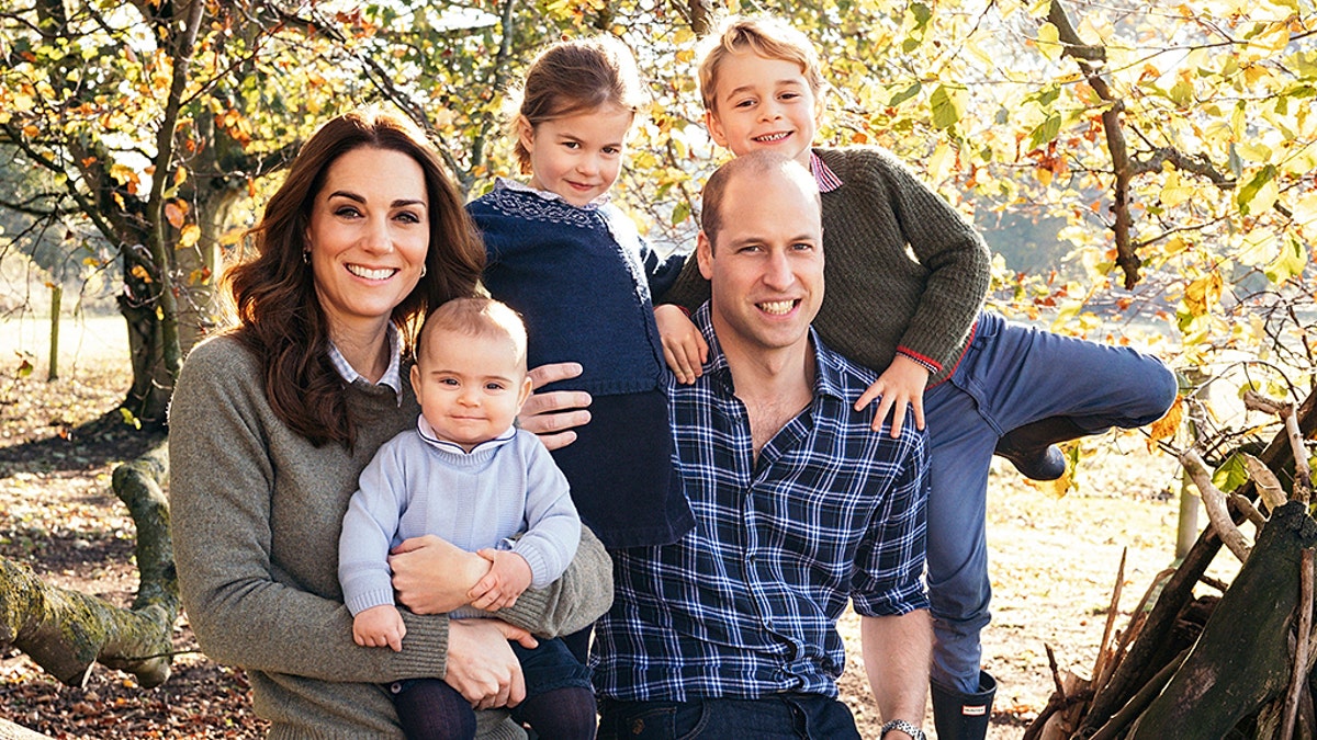 Britain's Prince William and Kate, Duchess of Cambridge with their children Prince George, right, Princess Charlotte, center, and Prince Louis.