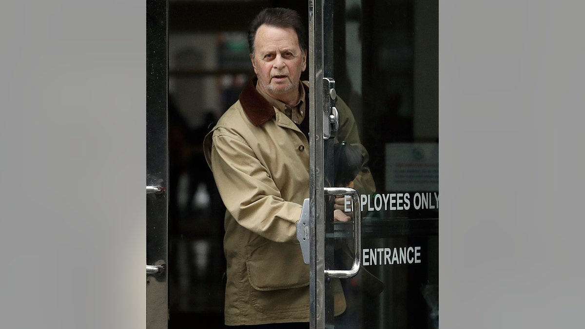 FILE - In this Feb. 25, 2019, file photo, Edwin Hardeman, right, leaves a federal courthouse in San Francisco. (AP Photo/Jeff Chiu)
