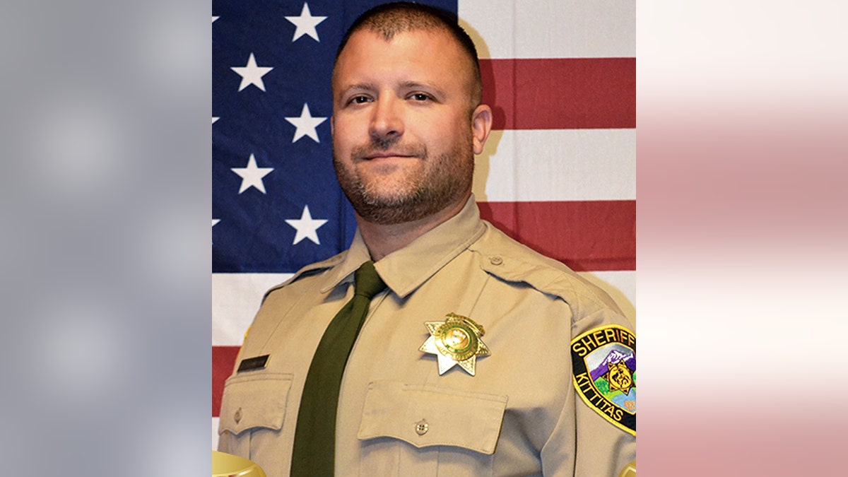 Sheriff's Deputy Ryan Thompson, 42, was shot and killed and a police officer was wounded after they exchanged gunfire with a road rage driving suspect Tuesday, authorities said Wednesday. (Kittitas County Sheriff's Office via AP)