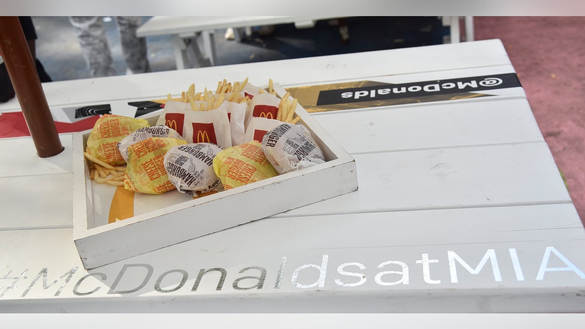 The 21-year-old McDonald's employee reportedly became unhappy with his 18-year-old co-worker, allegedly because she was working too slow.