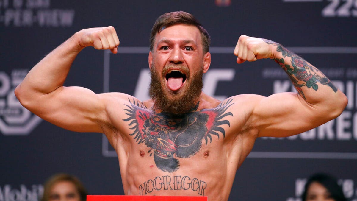 Conor McGregor flexing