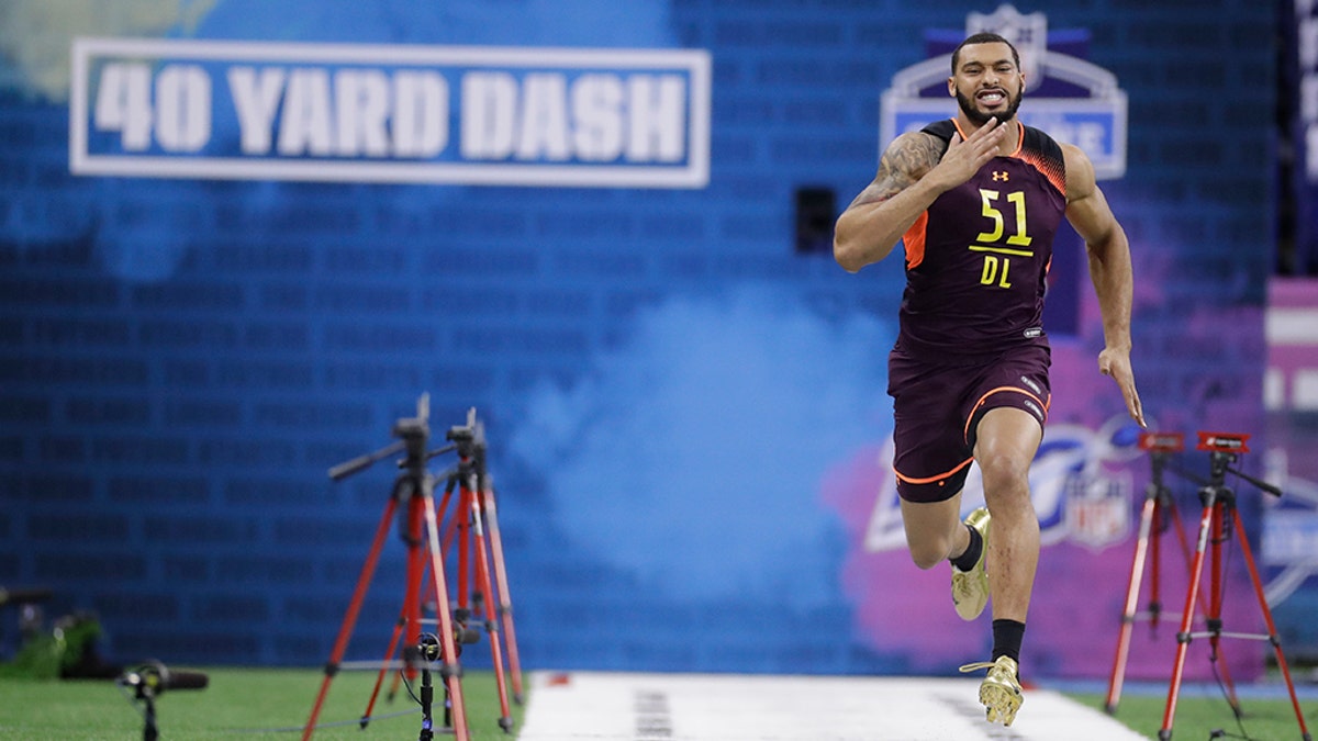 Mississippi State defensive lineman Montez Sweat runs the 40-yard dash during the NFL football scouting combine Sunday in Indianapolis. (AP Photo/Darron Cummings)