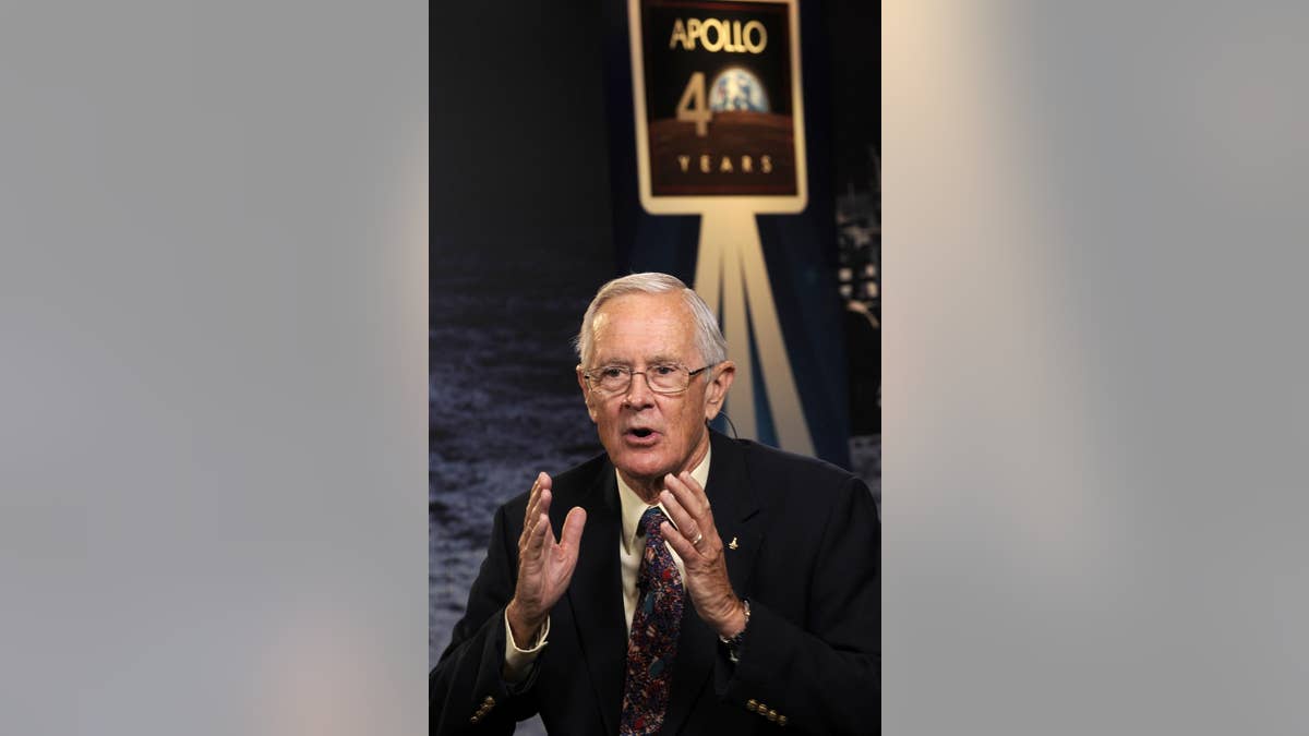 File photo - Apollo 16 astronaut Charles Duke responds to a question during a live television interview on Monday, July 20, 2009, at NASA Headquarters in Washington.