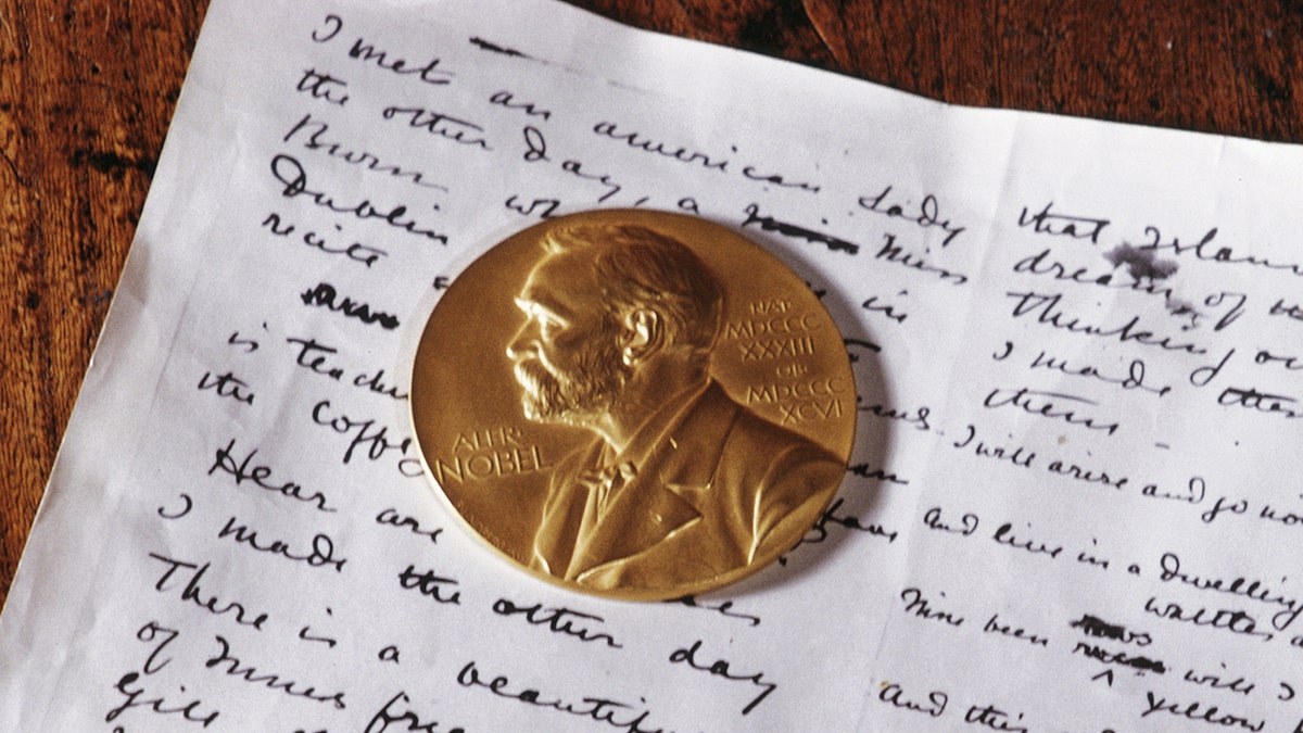The Nobel gold medal and a manuscript belonging to Irish playwright and poet William Butler Yeats (1865-1939) on display at the Sligo museum, County Sligo, Ireland January 1968.  Yeats won the Nobel prize for literature in 1923.  (Photo by RDImages/Epics/Getty Images)
