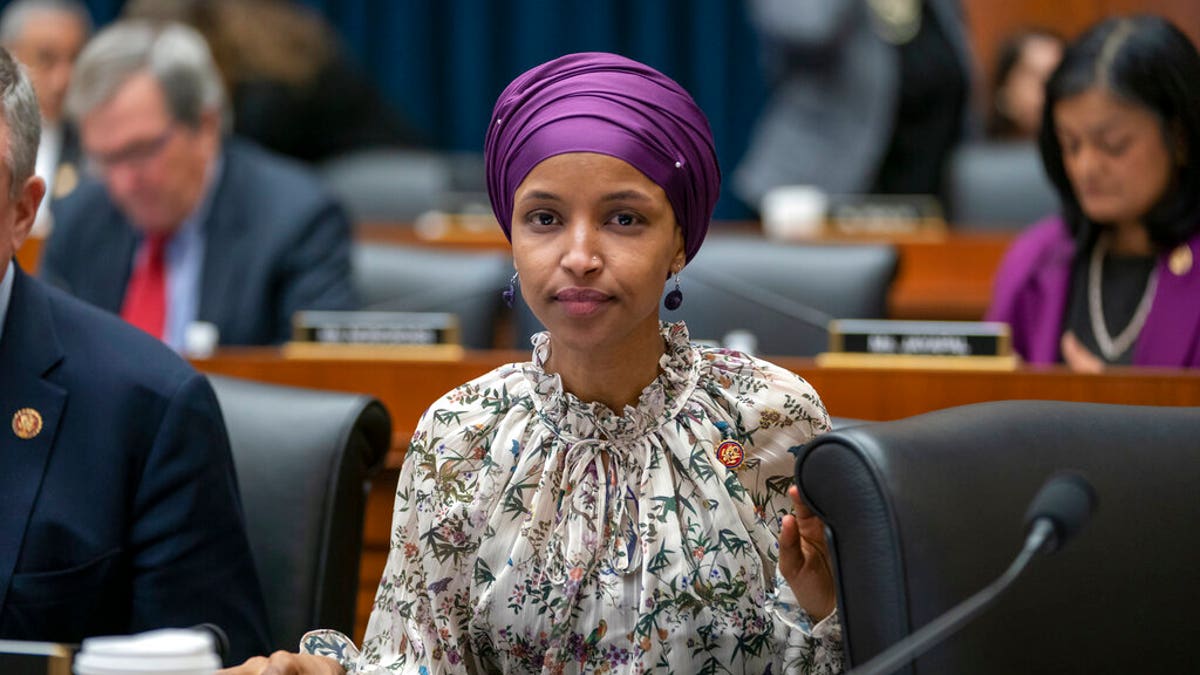 Rep. Ilhan Omar, D-Minn., sits with fellow Democrats on the House Education and Labor Committee during a bill markup, on Capitol Hill in Washington, Wednesday, March 6, 2019. (AP Photo/J. Scott Applewhite)