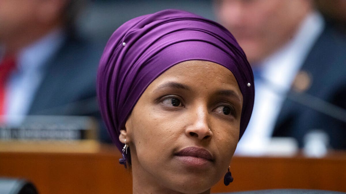 Rep. Ilhan Omar, D-Minn., sits with fellow Democrats on the House Education and Labor Committee during a bill markup, on Capitol Hill in Washington, Wednesday, March 6, 2019. (AP Photo/J. Scott Applewhite)