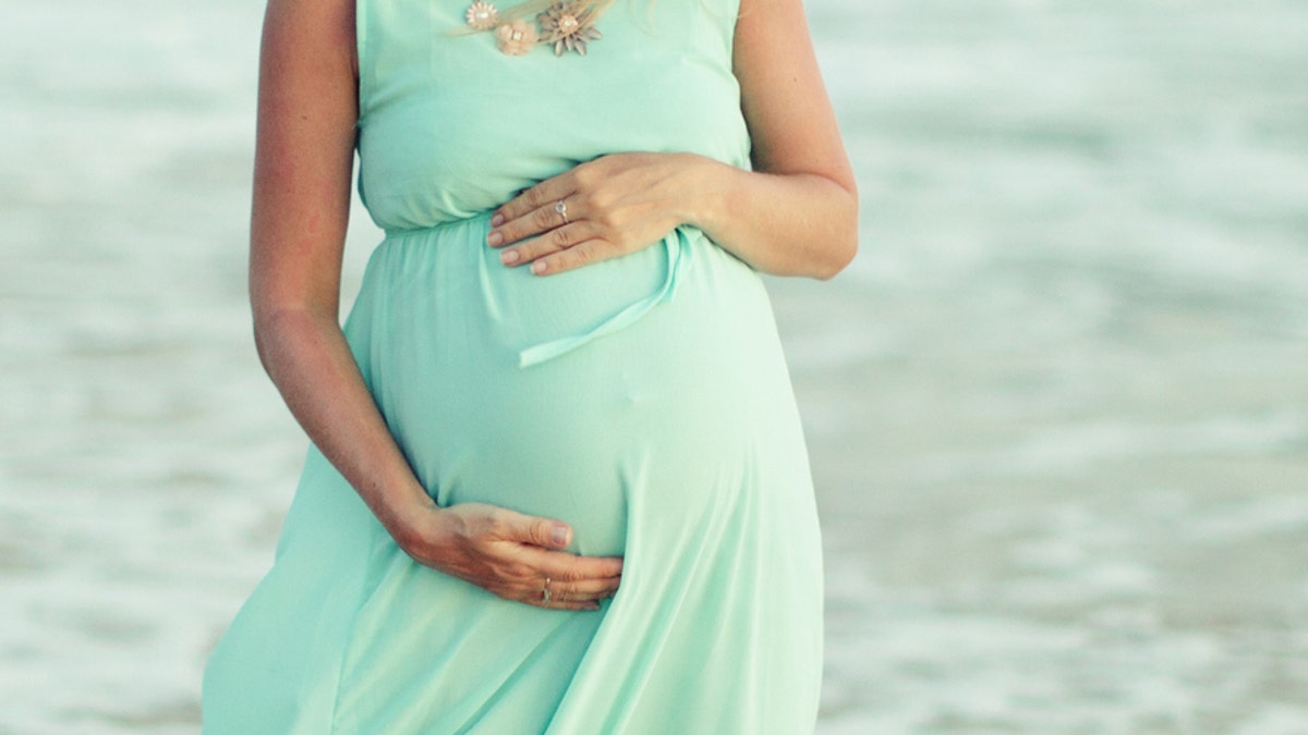 pregnant woman in dress