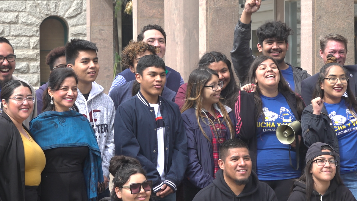 Students and Healthy Working Families Coalition, which included the host Living United for Change Arizona (LUCHA), protest the bill outside of the Arizona State Capitol building