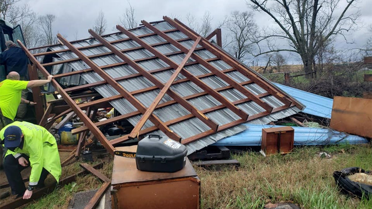 Dozens of emergency responders rushed in to assist in Lee County, Alabama, after what appeared to be a large tornado struck Sunday afternoon as part of a powerful storm system raking the Southeast. (Steven MacLeroy)