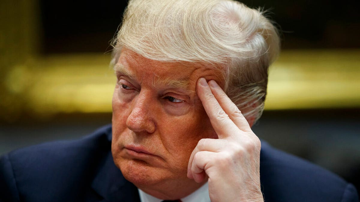 President Donald Trump listens during a briefing on drug trafficking at the southern border in the Roosevelt Room of the White House, Wednesday, March 13, 2019, in Washington. Trump said during the event the U.S. is issuing an emergency order grounding all Boeing 737 Max 8 and Max 9 aircraft "effective immediately," in the wake of the crash of an Ethiopian Airliner that killed 157 people. (AP Photo/Evan Vucci)