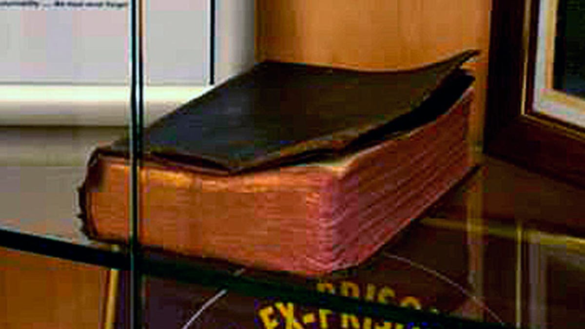 A Bible donated by a World War II veteran on display in a Manchester VA Medical Center memorial is being targeted by the Military Religious Freedom Foundation.