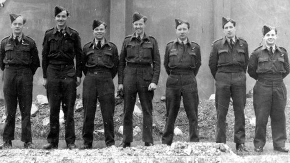 Blackham, center, and members of his squadron in WWII.